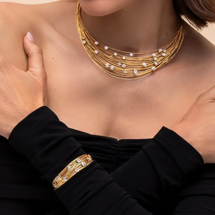 Bracelets Hand crafted in 18k yellow gold and set with 22 highquality round brilliant cut diamonds Spread The Love Bracelet